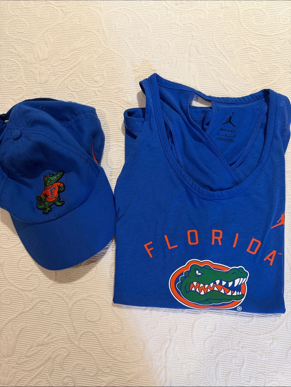 Nike Open Back Royal Blue Florida Gators Graphic Tank and hat.